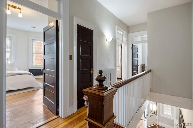 2706 W Grace St, Richmond, VA 23220 - hall with an upstairs landing, wood finished floors, and baseboards