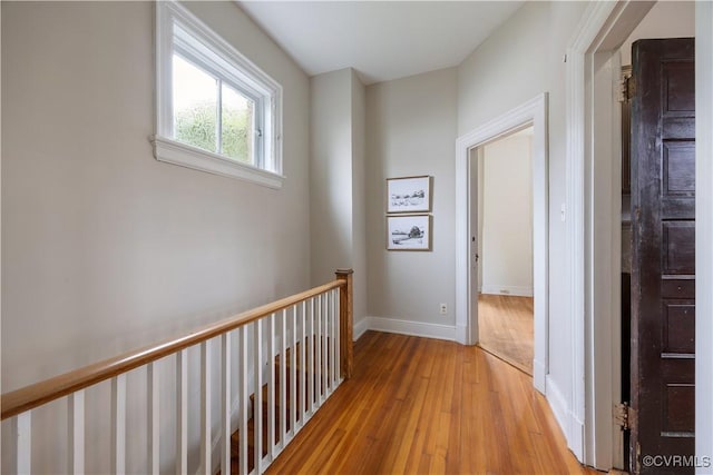 2706 W Grace St, Richmond, VA 23220 - hall featuring light wood-style flooring, an upstairs landing, and baseboards