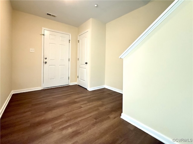 3000 Perdue Springs Ln, Chester, VA 23831 - foyer with baseboards and dark wood-style flooring