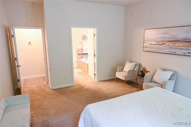 5801 Riverside Trl, Richmond, VA 23225 - bedroom with light colored carpet, baseboards, and ensuite bathroom