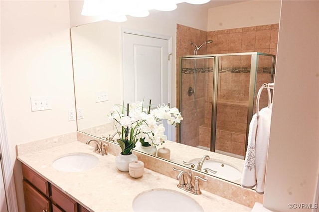 5801 Riverside Trl, Richmond, VA 23225 - bathroom featuring a shower stall and double vanity