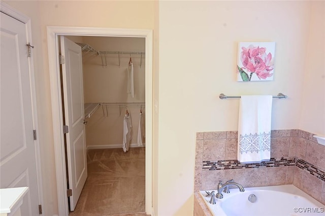 5801 Riverside Trl, Richmond, VA 23225 - bathroom with a spacious closet and a garden tub