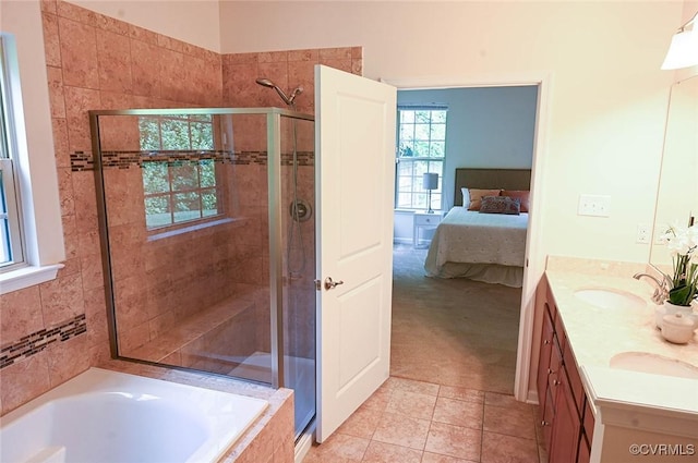 5801 Riverside Trl, Richmond, VA 23225 - full bath featuring a stall shower, ensuite bath, a bath, double vanity, and tile patterned flooring