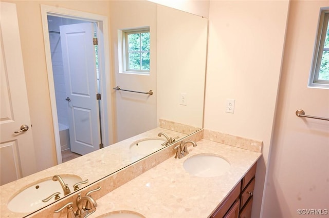 5801 Riverside Trl, Richmond, VA 23225 - bathroom featuring double vanity and a tub