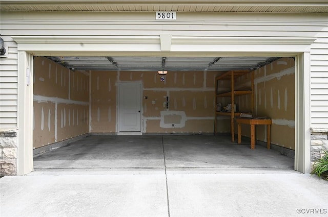 5801 Riverside Trl, Richmond, VA 23225 - garage featuring concrete driveway