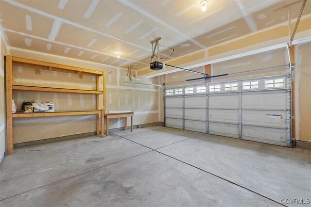 5801 Riverside Trl, Richmond, VA 23225 - garage featuring a garage door opener