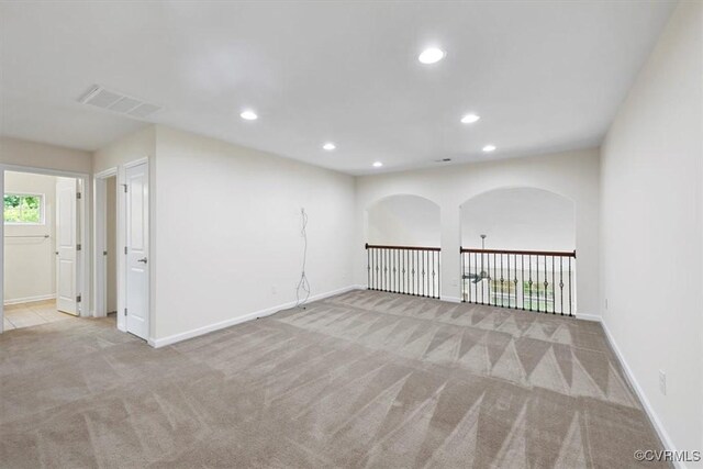 5801 Riverside Trl, Richmond, VA 23225 - carpeted empty room with recessed lighting, baseboards, and arched walkways