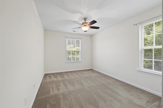 5801 Riverside Trl, Richmond, VA 23225 - empty room featuring plenty of natural light, carpet flooring, baseboards, and a ceiling fan