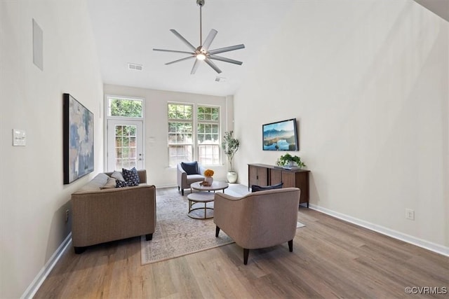 5801 Riverside Trl, Richmond, VA 23225 - living area featuring wood finished floors, high vaulted ceiling, a ceiling fan, and baseboards
