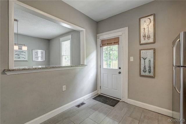 entryway with baseboards
