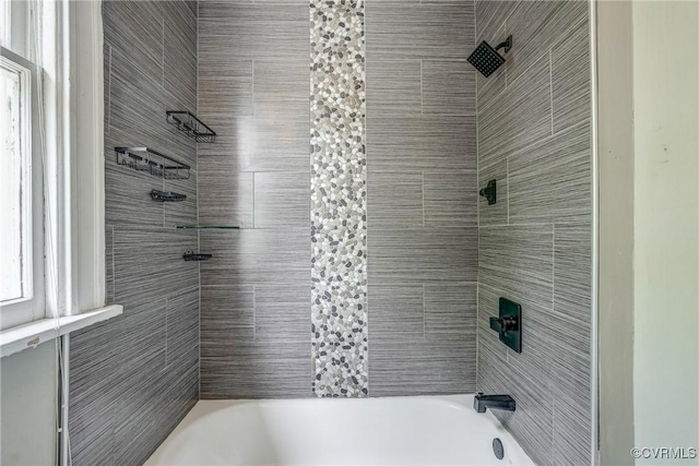 full bath featuring bathing tub / shower combination