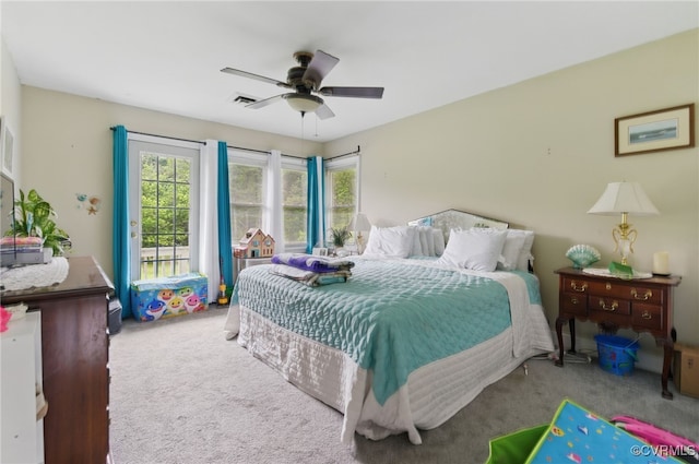 12060 Pinhook Rd, Hanover, VA 23146 - carpeted bedroom featuring multiple windows and ceiling fan