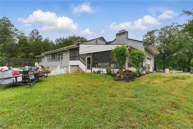 12060 Pinhook Rd, Hanover, VA 23146 - view of front of house with a sunroom, a chimney, and an attached garage