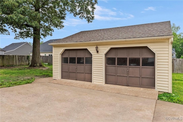 detached garage with fence