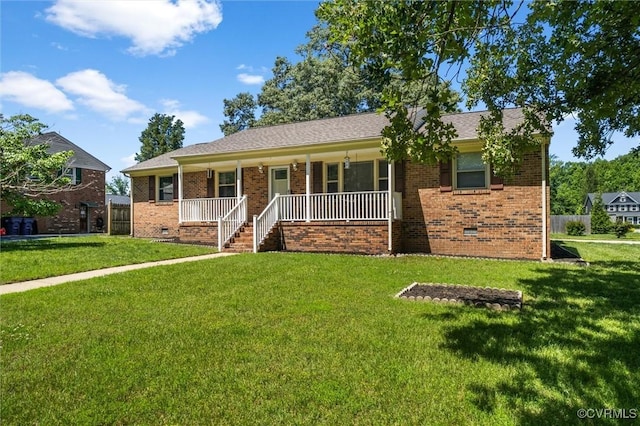 ranch-style home with brick siding, crawl space, covered porch, and a front yard