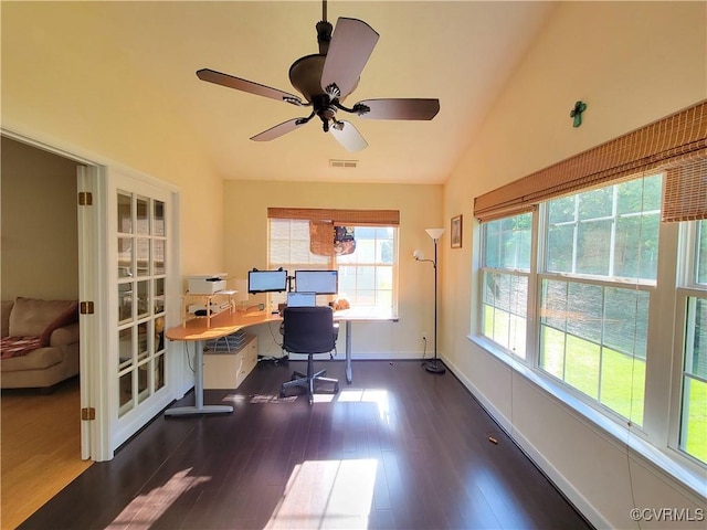 office space featuring wood finished floors, lofted ceiling, ceiling fan, and baseboards