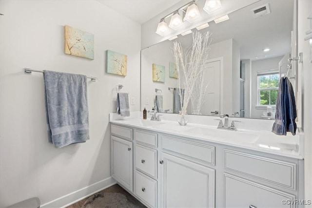 11301 Winding Brook Terrace Dr, Hanover, VA 23005 - full bathroom with double vanity and baseboards