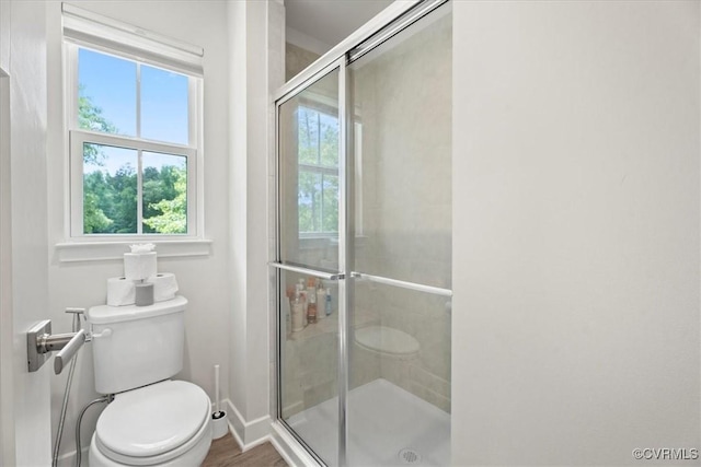 11301 Winding Brook Terrace Dr, Hanover, VA 23005 - full bath featuring a shower stall, toilet, and baseboards