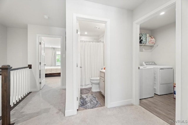 11301 Winding Brook Terrace Dr, Hanover, VA 23005 - ensuite bathroom with washer and clothes dryer, baseboards, toilet, recessed lighting, and vanity