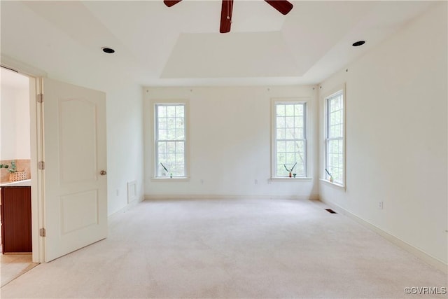 5470 Tyshire Pkwy, Providence Forge, VA 23140 - empty room with ceiling fan, light carpet, a tray ceiling, and baseboards
