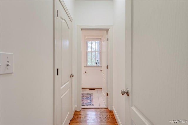 5470 Tyshire Pkwy, Providence Forge, VA 23140 - corridor with baseboards and light wood-style floors