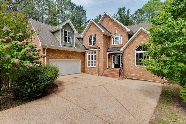 5470 Tyshire Pkwy, Providence Forge, VA 23140 - traditional-style home featuring brick siding, concrete driveway, and roof with shingles