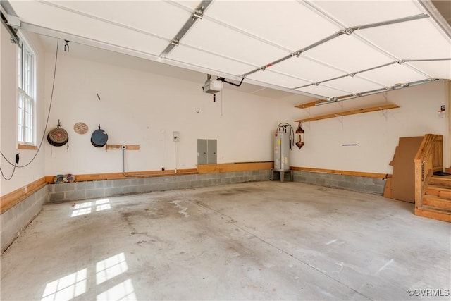 5470 Tyshire Pkwy, Providence Forge, VA 23140 - garage with water heater and a garage door opener