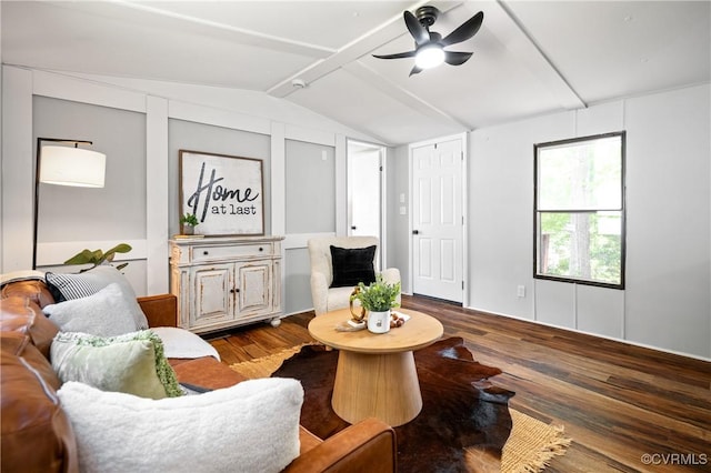 living room with wood finished floors and a ceiling fan