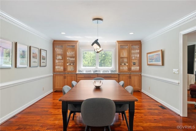 17475 Millfield Ln, Hanover, VA 23192 - dining space with crown molding, dark wood-style floors, recessed lighting, and baseboards
