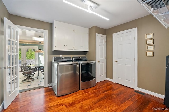 17475 Millfield Ln, Hanover, VA 23192 - laundry room with cabinet space, french doors, dark wood-style floors, washer and clothes dryer, and baseboards
