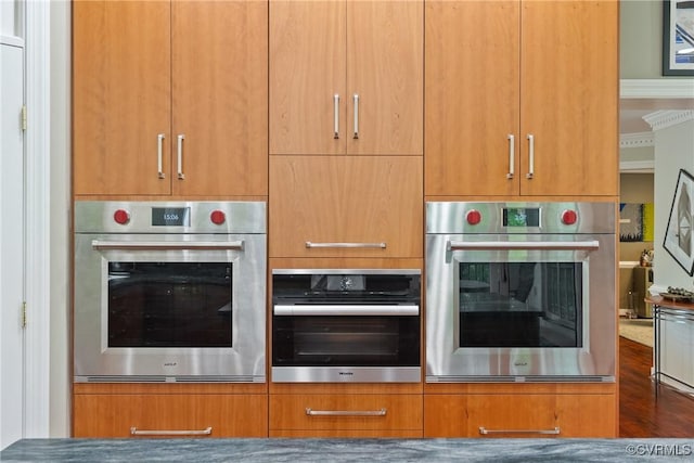 17475 Millfield Ln, Hanover, VA 23192 - kitchen featuring stainless steel oven, modern cabinets, and wood finished floors