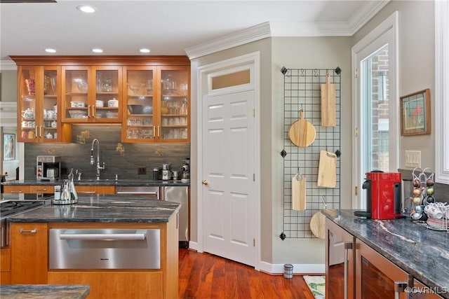 17475 Millfield Ln, Hanover, VA 23192 - bar with a warming drawer, ornamental molding, dark wood-type flooring, backsplash, and a sink