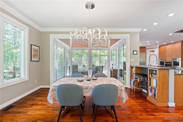17475 Millfield Ln, Hanover, VA 23192 - dining room featuring a chandelier, ornamental molding, healthy amount of natural light, baseboards, and recessed lighting