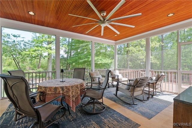 17475 Millfield Ln, Hanover, VA 23192 - sunroom featuring a ceiling fan, outdoor dining space, and view of wooded area