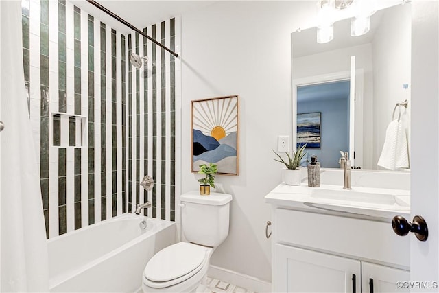 full bathroom featuring toilet, vanity, baseboards, and shower / tub combination
