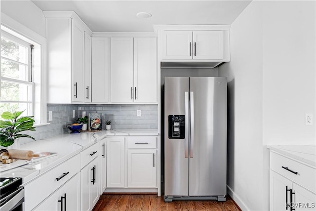 7910 San Juan Rd, Henrico, VA 23229 - kitchen featuring stainless steel appliances, white cabinetry, backsplash, and light stone counters