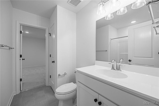 8264 Mount Eagle Rd, Hanover, VA 23005 - bathroom with toilet, vanity, baseboards, tile patterned floors, and a shower