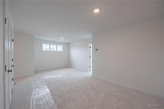 8264 Mount Eagle Rd, Hanover, VA 23005 - below grade area featuring light colored carpet, recessed lighting, and baseboards