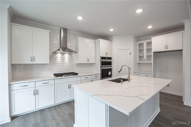 8264 Mount Eagle Rd, Hanover, VA 23005 - kitchen with wall chimney range hood, a sink, white cabinets, wood finished floors, and recessed lighting