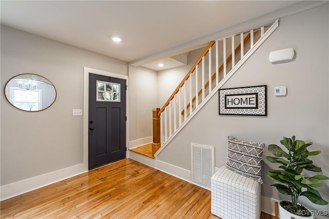6101 Lewis Rd, North Dinwiddie, VA 23803 - foyer entrance with stairs, baseboards, light wood-style flooring, and recessed lighting