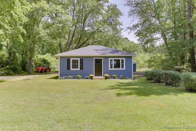 917 Chapel Neck Rd, North, VA 23128 - view of front of property with a front lawn and roof with shingles