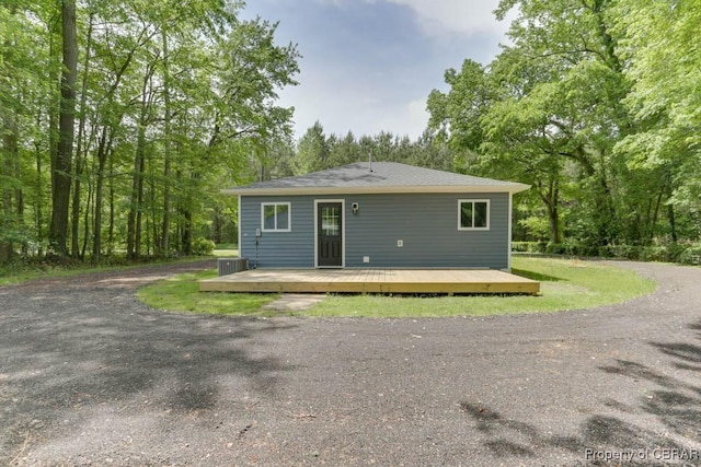 917 Chapel Neck Rd, North, VA 23128 - rear view of house with cooling unit and a wooden deck