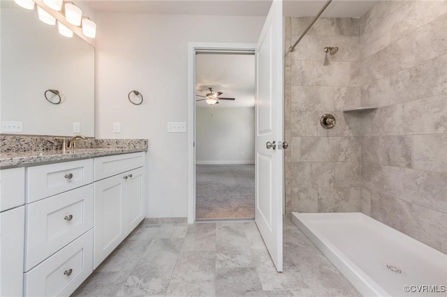 409 Confederate Dr, Orange, VA 22508 - bathroom with vanity, a tile shower, and a ceiling fan