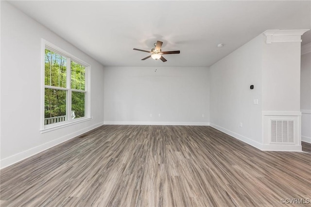409 Confederate Dr, Orange, VA 22508 - empty room featuring wood finished floors, ceiling fan, and baseboards
