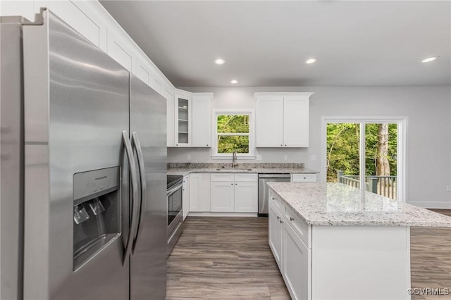 409 Confederate Dr, Orange, VA 22508 - kitchen with appliances with stainless steel finishes, a sink, a center island, white cabinets, and recessed lighting