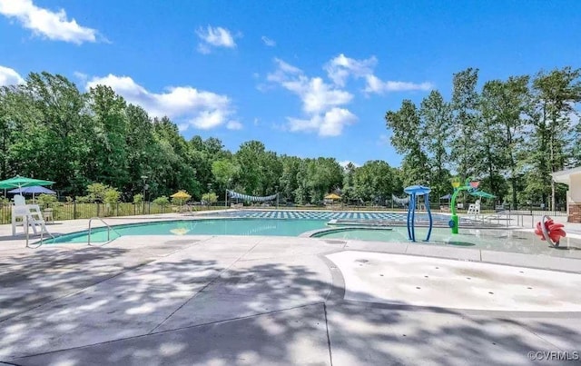 409 Confederate Dr, Orange, VA 22508 - community pool with fence, a patio area, and view of scattered trees