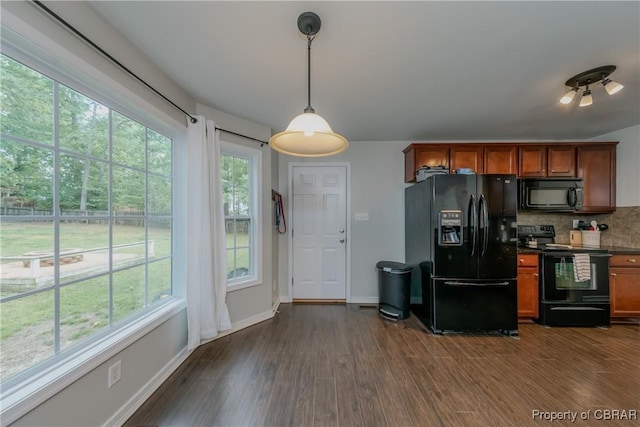 5631 Buckhunt Ln, New Kent, VA 23124 - kitchen featuring black appliances, dark countertops, backsplash, dark wood-style flooring, and brown cabinetry