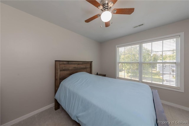 5631 Buckhunt Ln, New Kent, VA 23124 - carpeted bedroom with baseboards and a ceiling fan