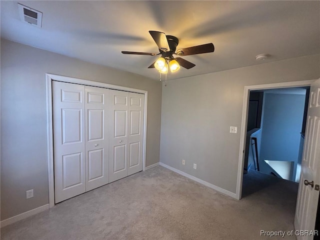 5631 Buckhunt Ln, New Kent, VA 23124 - unfurnished bedroom with carpet floors, baseboards, a closet, and a ceiling fan