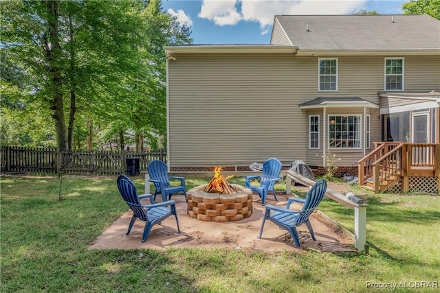 5631 Buckhunt Ln, New Kent, VA 23124 - rear view of property with a fire pit and a patio area